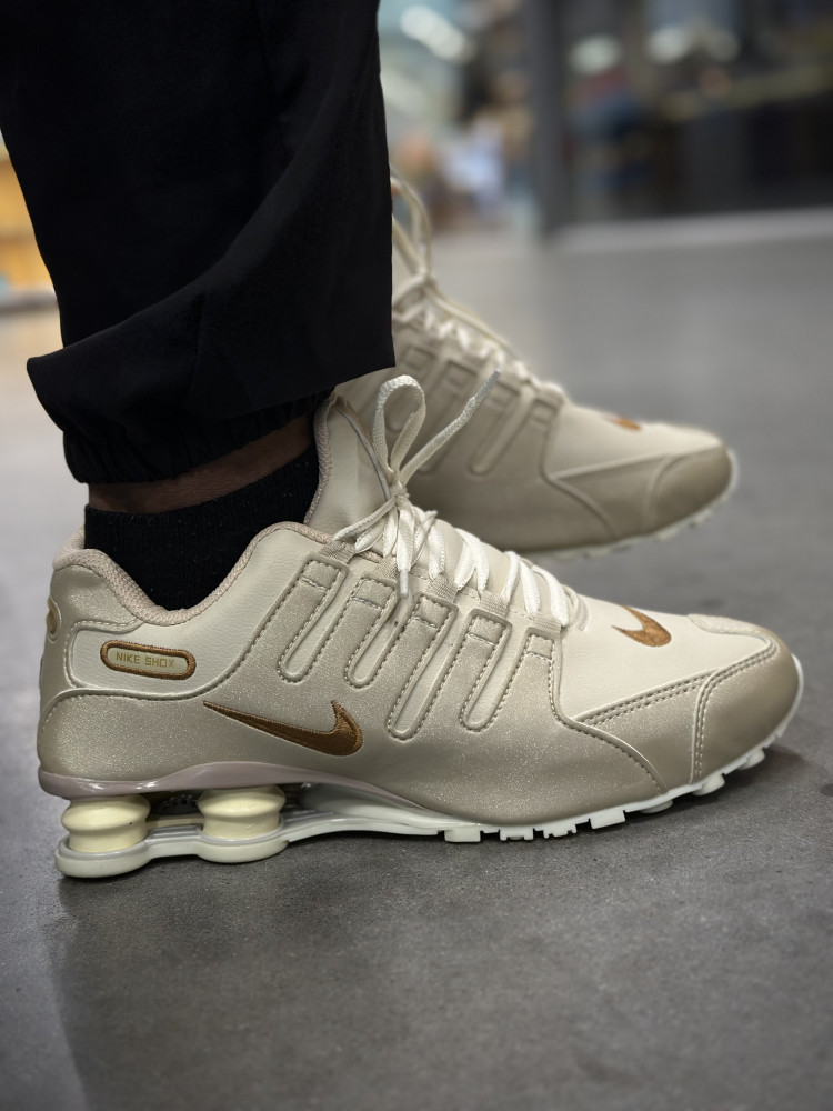 TENIS SHOX NZ DOURADO 38 - Lion Store
